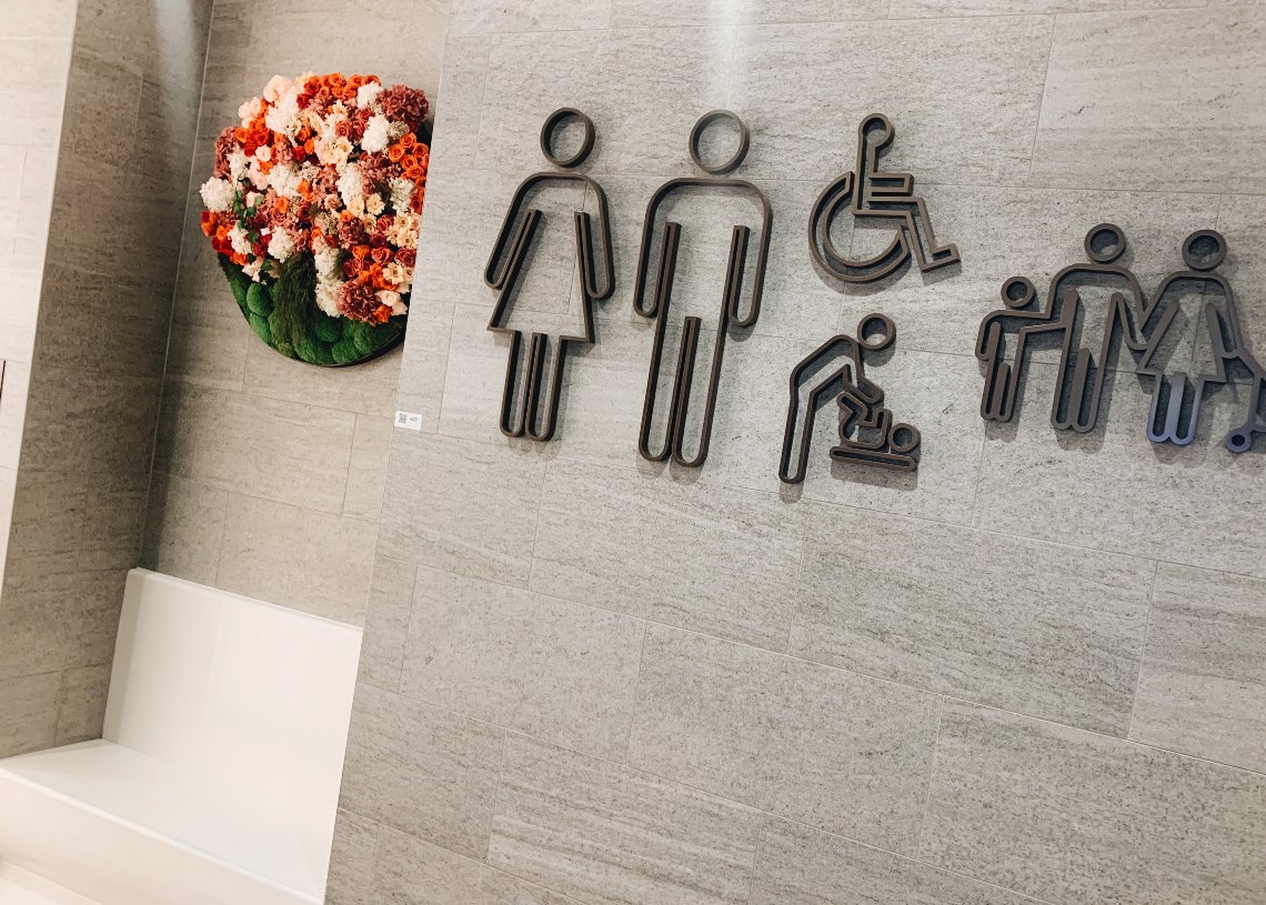 Fresh flowers at the entrance of a toilet in Jewel Changi Airport