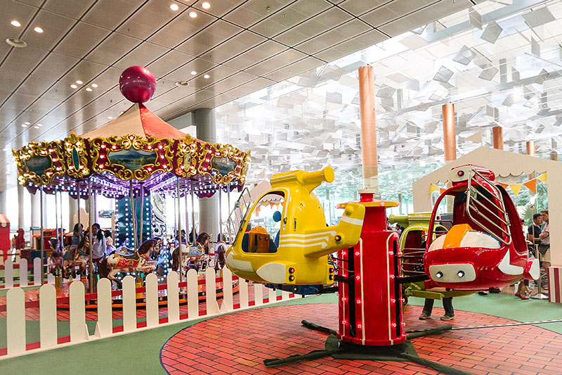 Image of Carousel and Heli-Jet rides at the Changi Loves Kids Carnival