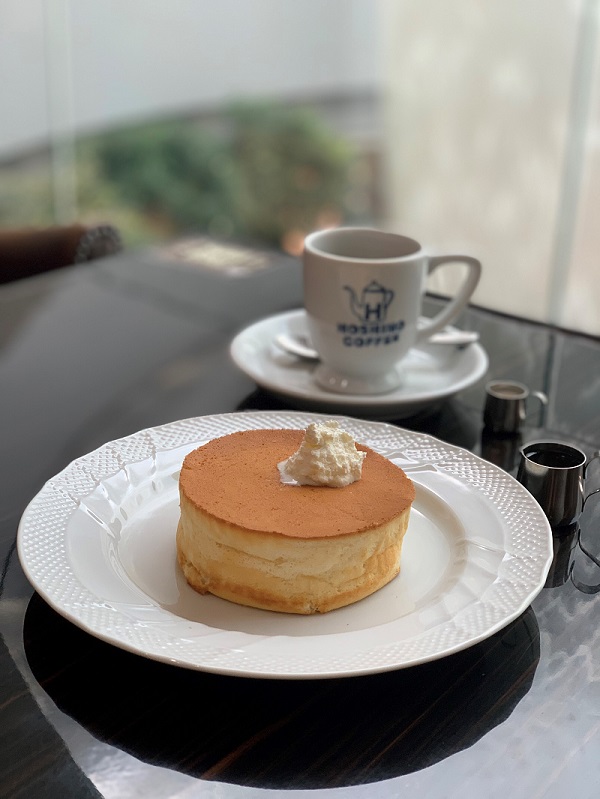 a plate of souffle pancakes with a cup of hand-dripped coffee by hoshino coffee, jewel changi, singapore