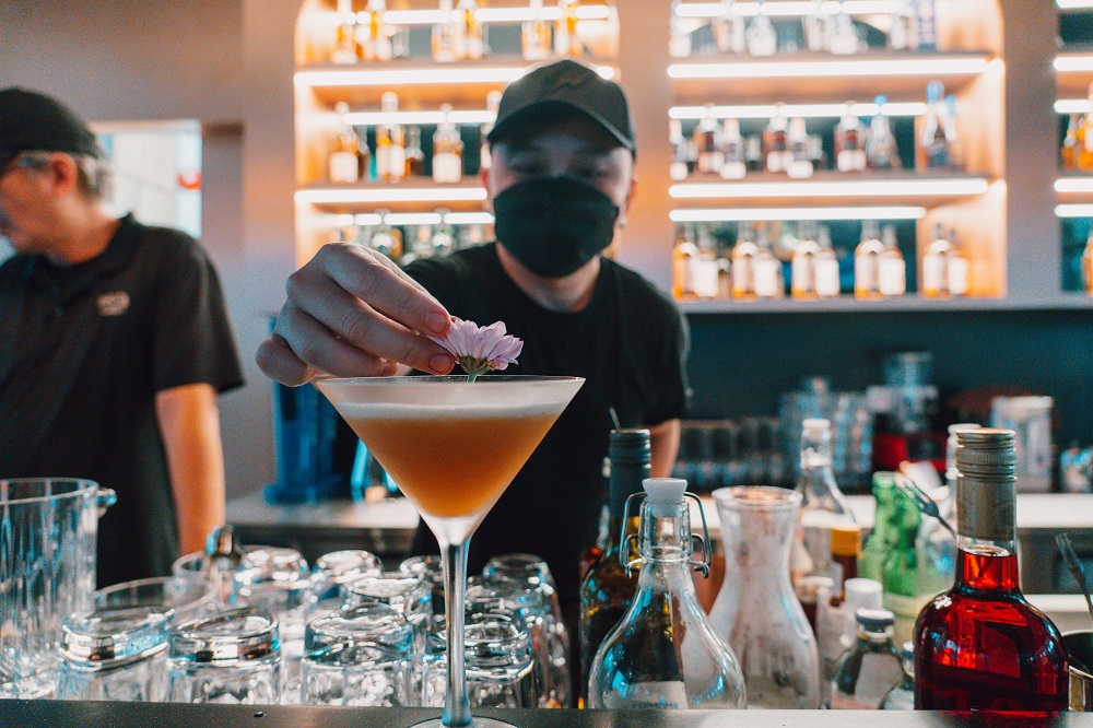 Bartender making cocktails at Overflow
