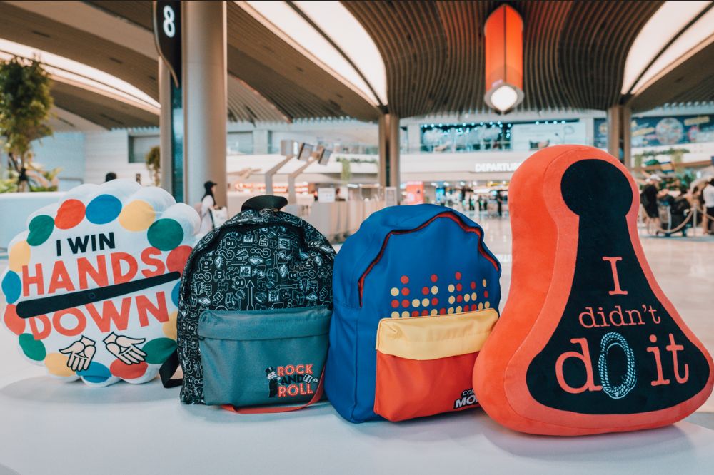 Merchandise that are exclusive to Changi Airport, including backpacks and cushions.