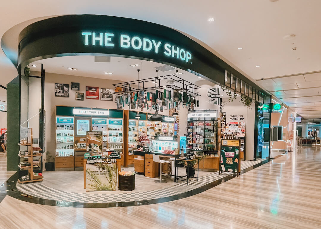 green-painted storefront of the body shop at jewel changi airport, singapore