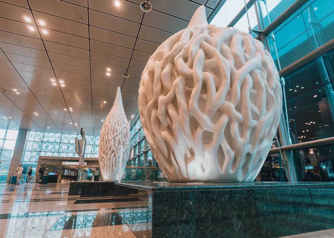 A wide shot of Flora Inspiration art sculpture in Terminal 3