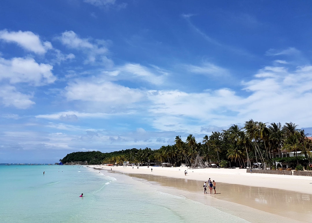 boracay shoreline, parasailing in philippines