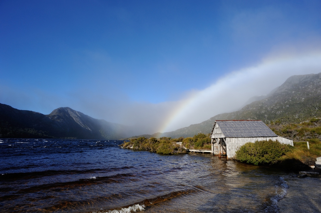 A rainbow dots the landscape of Cradle Mountain-Lake St Clair National Park