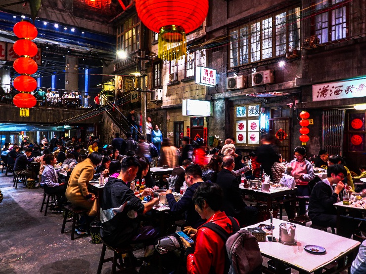 Dining area that creates a road-side dining experience in Wen He You Lao Chang Sha Long Xia Guan at Hisense Plaza, Changsha