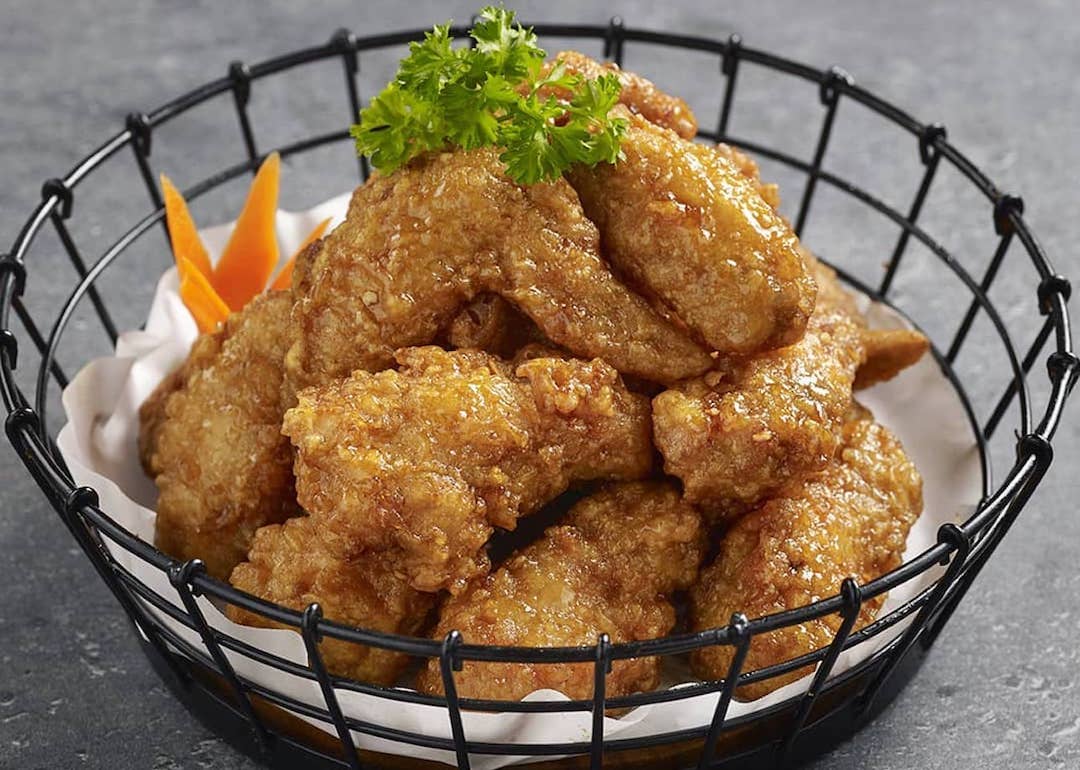 crispy soy garlic chicken korean fried chicken in a basket