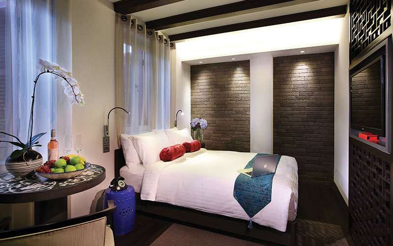 The chic rooms at Amoy Hotel is the perfect launch pad to get your game on before a night of revelry.