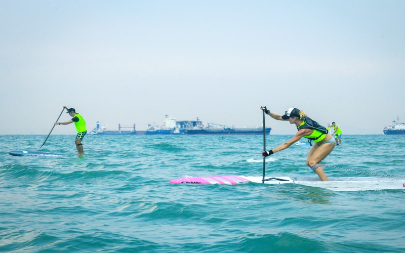 Stand-up paddlers in action