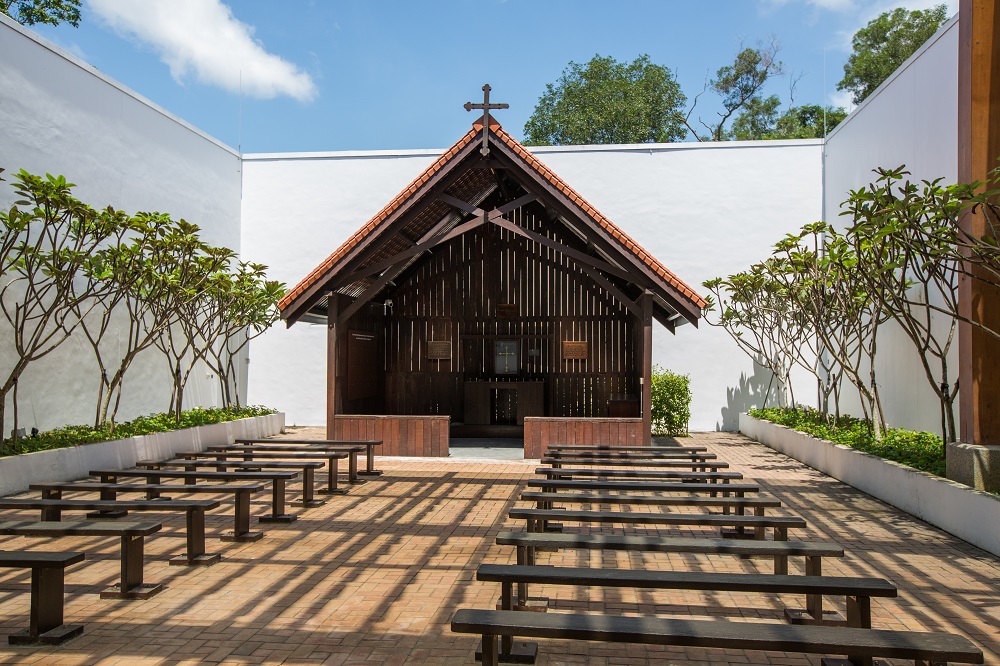 wooden pews at the changi chapel, located at the changi precinct of singapore