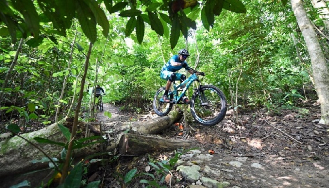 mountain biker rides on the off road trails at chestnut nature park